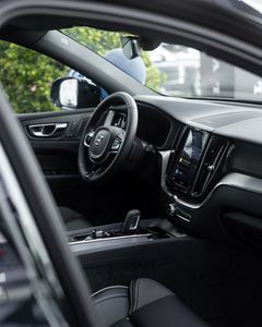 Explore the sleek and modern interior of a Volvo XC60, showcasing luxurious and contemporary design elements.